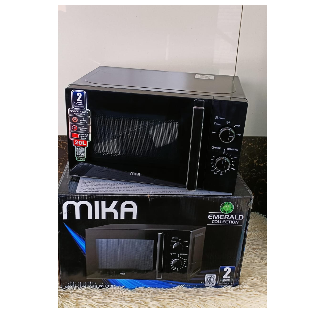 Black 20 litres Mika manual microwave